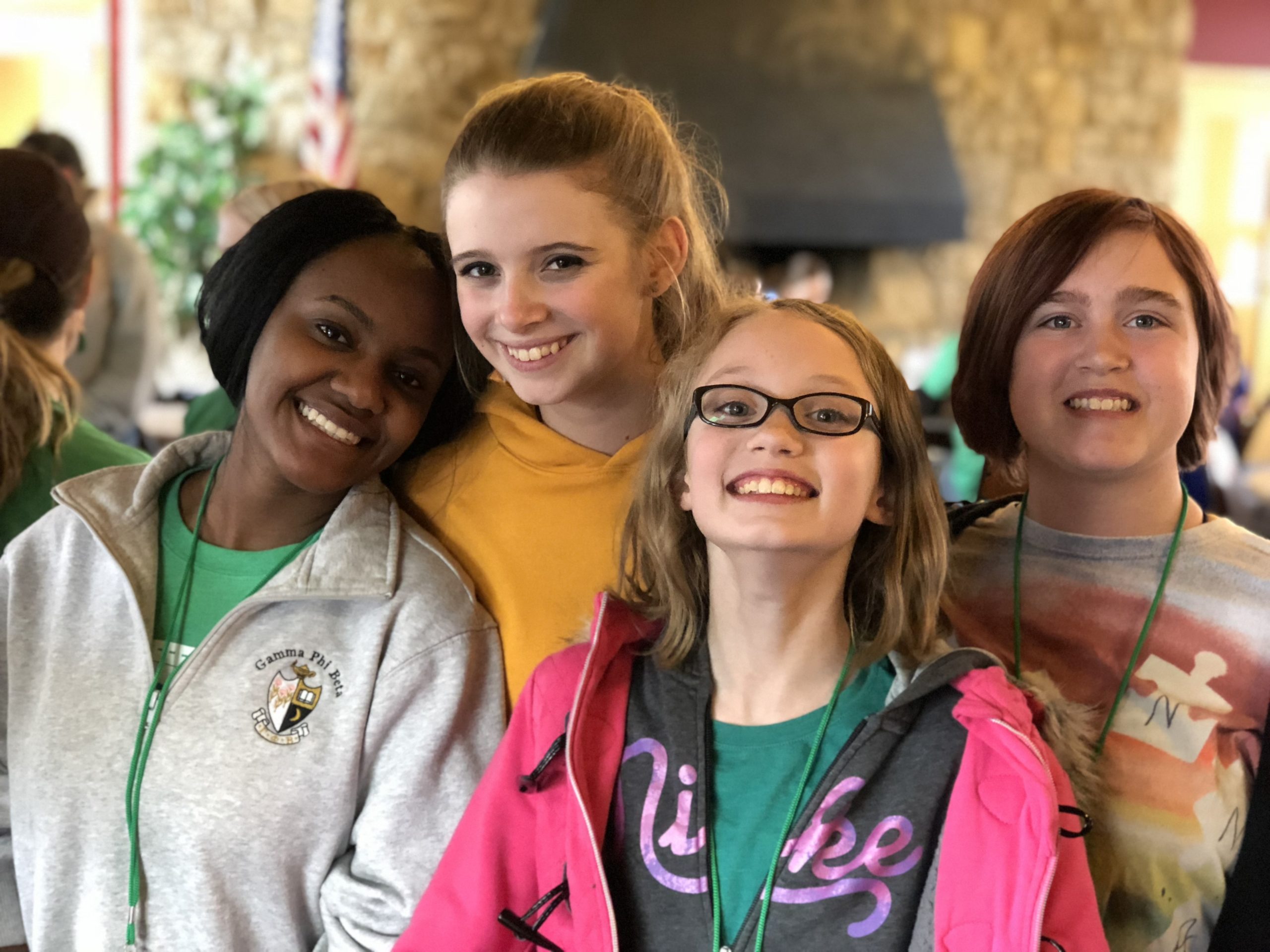 4 Autistic youth having fun together at camp